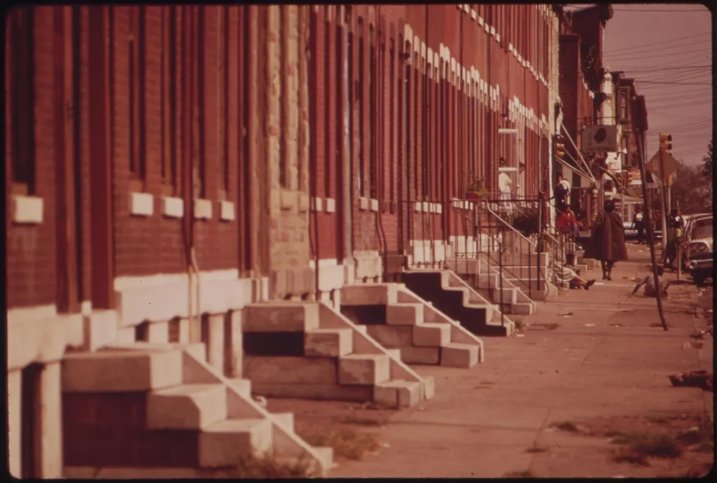 Row of brick Philadelphia rowhouses with front stoops